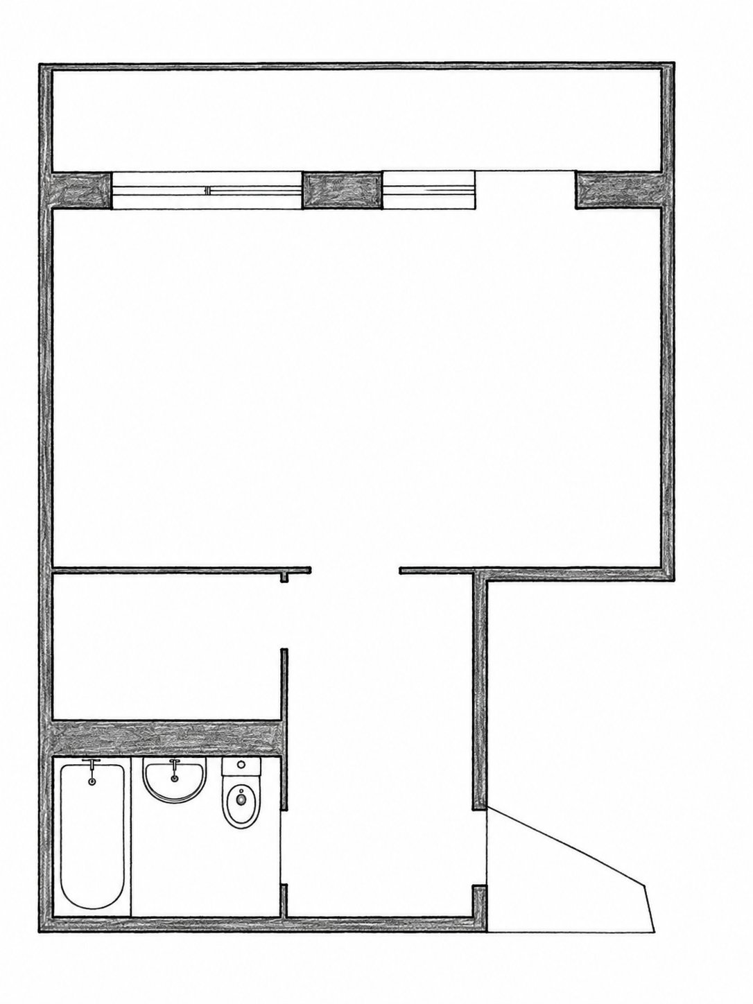Architectural floor plan of a one-bedroom apartment showing bedroom, living area, bathroom, and kitchen layout