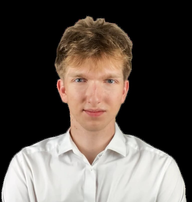 Professional headshot of a young man with light brown hair wearing a white collared shirt against a black background
